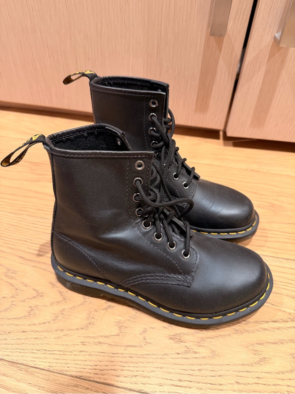 Dr. Martens Black Leather Combat Boots with Yellow Stitching